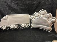 Crown and truck cake pans front view