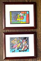 Both framed Britto prints together