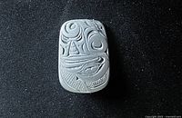front view showing Haida design on pewter brooch