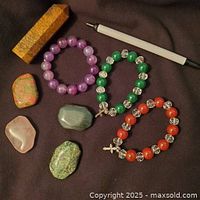 All items with pen for scale