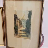 Framed hand-colored etching showing full artwork and frame