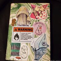 front cover with stickers and marbled design