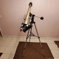 Full view of Tasco telescope on tripod