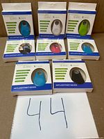 Eight boxed anti-lost Bluetooth trackers assorted colours front view