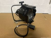 Overall view of Source Four PAR light with cable and plug