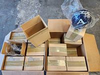 Open cartons showing multiple boxed radios and a few visible helmet units