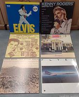 All six LPs laid out showing front covers