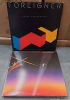 Foreigner and Supertramp album front covers