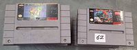 Super Mario World and Street Fighter II cartridges