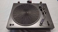 Top view showing entire Akai AP-001C turntable with platter and tonearm