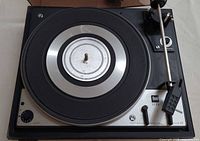 Top view of Dual 1225 turntable showing platter, tonearm, controls