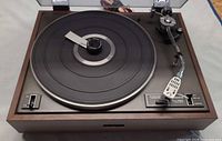 Top view of Pioneer PL-12D showing platter, tonearm and controls