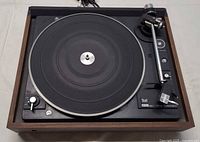 Top view of Dual 510 turntable showing platter, tonearm and wood base