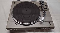 Top view of Pioneer PL-520 turntable showing platter, tonearm, controls and dust cover