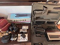 Overall lot with hard case camcorder, tripod box, cameras and accessories