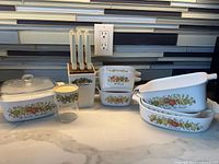 Full lot showing all Corning Ware pieces, knife block and knives