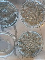 All four glass pieces shown together for pattern comparison and count confirmation