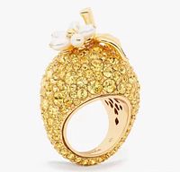 Side view of lemon-shaped pavé crystal ring with enamel flower