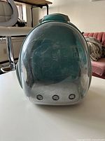 Front view showing transparent dome and ventilation holes