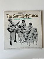 Front sleeve showing title and cast image