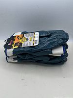 Stack of six pairs nitrile-coated gloves side view