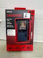 Front of sealed box showing product image, brand, capacity and screen size