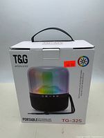 Front of box showing product image and model TG-325