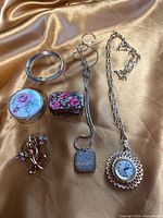 All six items laid out on fabric