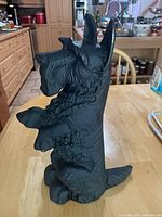 Left side view of cast iron Scottie dog doorstop