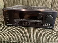 Front view of Onkyo TX-SR603X receiver showing controls and display