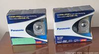 Two boxed Panasonic BL-C30C cameras side by side