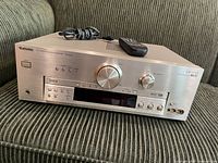 Front view showing Technics SA-DA8 receiver, remote and cable