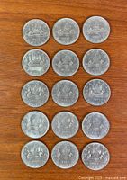 All 15 coins laid out showing Voyageur reverse and years