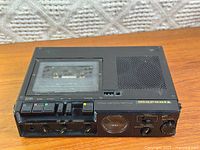 Top view showing cassette compartment, speaker grille, controls