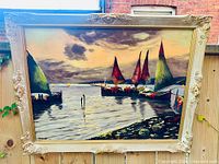 Front view of framed painting showing full composition and ornate frame