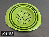 Strainer collapsed flat showing perforated base