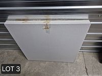 Sealed cardboard packaging containing board