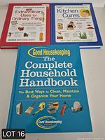 All three hardcover household reference books front covers visible