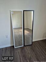 Both mirrors front view against wall