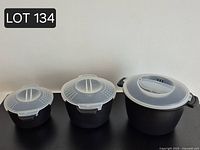 Front view of all three steamers with lids attached