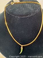 Full view of necklace on display bust