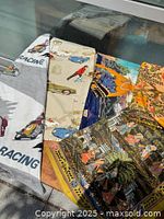 Stacked view of all printed fabrics showing motifs and colours