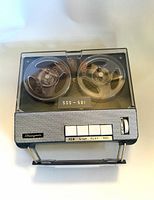 Top view showing Shinagawa SSS-501 recorder with both reels under smoked lid