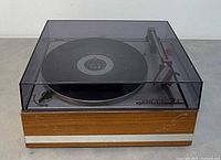 Front view of Telefunken De Luxe turntable with closed dust cover