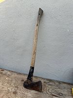 Full view of axe showing complete length and condition