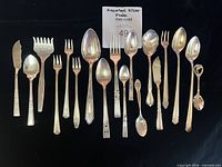 Full group of assorted silver plated flatware pieces