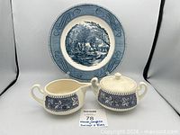 Front view of plate, creamer and sugar bowl