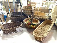 All eight baskets arranged on table showing variety