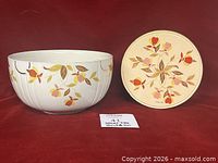 Ceramic mixing bowl and matching tin displayed