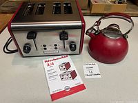 Toaster front view with kettle and manual